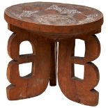 A KENYAN KAMBA CARVED WOODEN STOOL with stylised-bird bead inlay and another with twisted wire