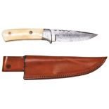 A MAAN DAMASCUS STEEL HUNTING KNIFE WITH MARINE IVORY HANDLE and leather sheath. 23.5 cms long Note: