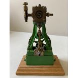 A STUART TURNER VERTICAL STEAM ENGINE and another similar by Stuart. 25 cms max PROVENANCE: The