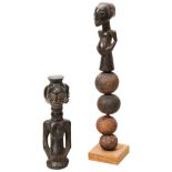 A HEMBA FOUR FACE CARVED WOODEN FIGURE and a Hemba rattle. 44 cms max PROVENANCE: The David