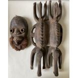 A DOUBLE CROCODILE MASK/HEADDRESS possibly Senufo and a Dogon style mask with raffia beard. 20th