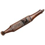 A FINELY CARVED SHONA KNIFE the wooden sheath decorated with geometric designs. PROVENANCE: The