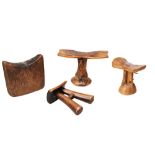 A SOMALIAN 'A' SHAPED CARVED WOODEN HEADREST and three other headrests PROVENANCE: The David