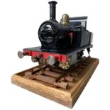 A ENGINEERED 3 1/2’ GAUGE MODEL OF  0-4-0 OPEN CAB NARROW GAUGE SADDLE TANK LOCOMOTIVE This nicely