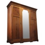 A 19TH CENTURY PITCH PINE COMPACTUM WARDROBE, comprising of a double width hanging section and a