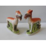 A PAIR OF 20TH CENTURY STAFFORDSHIRE STYLE FLAT BACK FIGURES, depicting two hunting dogs