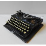 A VINTAGE IMPERIAL PORTABLE TYPEWRITER, circa 1950, ex Police issue