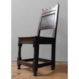 AN 18TH CENTURY OAK SIDE CHAIR WITH SOLID BACK AND STRETCHERS