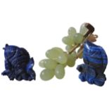 TWO CARVED LAPIS LAZULI TROPICAL FISH ORNAMENTS, both standing between 7 and 7.5 cm high, along with