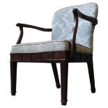 A GEORGE III MAHOGANY ARMCHAIR, with shaped arms, the back and seat covered in pale blue damask