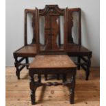 A PAIR OF 18TH CENTURY OAK CHAIRS, with fiddle backs, on turned square form legs united by