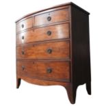 A GEORGE III MAHOGANY CHEST OF DRAWERS, two short drawers over three long drawers, on splayed