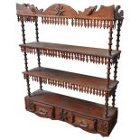 AN AMERICAN LATE 19TH CENTURY TRAMP ART WALL SHELF, the four tiers united by turned pillars, with