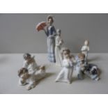A COLLECTION OF SEVEN LLADRO FIGURINES, a maiden, three children and three cherubs, the largest