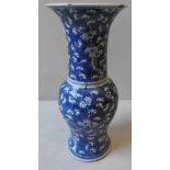 A CHINESE BLUE AND WHITE BALUSTER FORM VASE, Qing period, cracked ice and prunus decoration, 45 cm