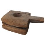 INDONESIAN WOODEN BLOCK MORTAR with circular aperture and side bar 52 H X 37 W X 48 D cms