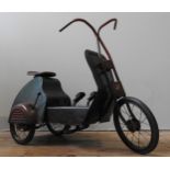 A VINTAGE TINPLATE PEDAL TRICYCLE