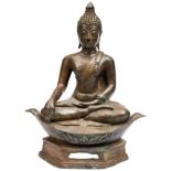 A  CAST BRONZE TIBETAN FIGURE OF BUDDHA, 22cm high