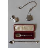 A SILVER VESTA, A SILVER PILL CASE AND AN ORNATE ENGRAVED EDWARD VII COMMEMORATIVE SILVER SPOON,