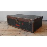 A VINTAGE LOUIS VUITTON SUITCASE, with LV monogram covering, monogrammed leather trim, no handle,