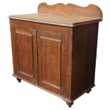 A 19TH CENTURY PINE CUPBOARD, with shaped back panel, moulded top, over two panelled doors, on