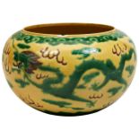 A GREEN AND AUBERGINE ENAMELLED YELLOW-GROUND JARDINIERE KANGXI MARK, 19TH / 20TH CENTURY the