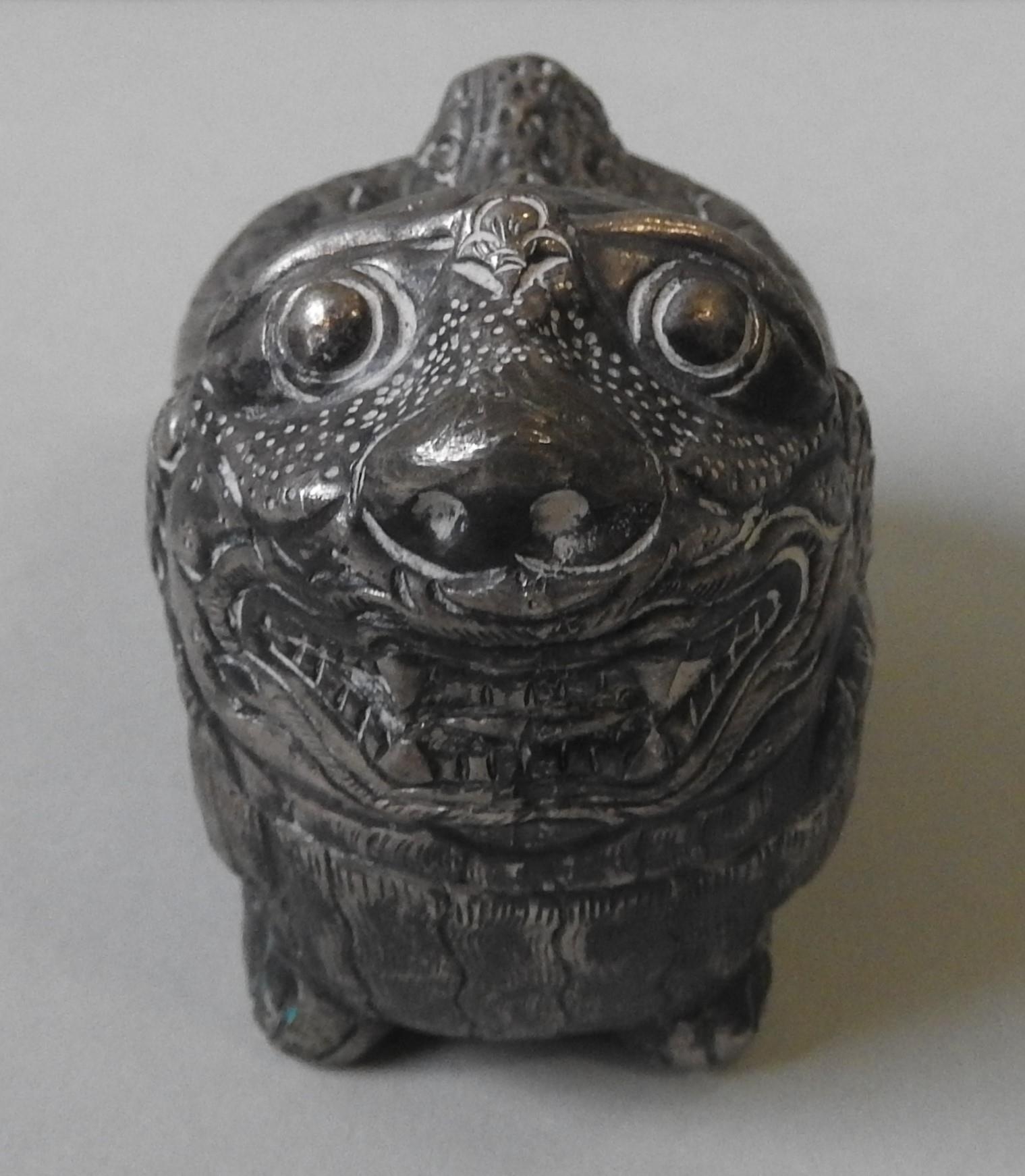 A CAMBODIAN SILVER BETEL BOX, in the form of a foo dog, early 20th century, 7cm high x 8 cm long - Image 2 of 4