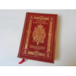 A RED LEATHER & GILT BOUND COPY OF THE ORDER OF SERVICE FROM THE CORONATION OF QUEEN ELIZABETH II,