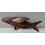 A CARVED 19TH CENTURY TREEN FIGURE OF FLYING FISH , stamped Pitcairn Island on the fin, the other