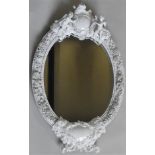 A 19TH CENTURY MEISSEN BLANC DE CHINE OVAL WALL MIRROR