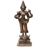 A FINE SMALL BRONZE OF PARVATI STANDING, 17TH/18TH CENTURY,  depicted with four arms and