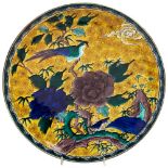 LARGE JAPANESE KO-KUTANI DISH 20TH CENTURY  decorated with a bird perched amidst blossoming stems,