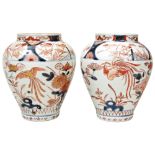 PAIR OF JAPANESE IMARI VASES EDO PERIOD, 17TH / 18TH CENTURY the baluster sides decorated in the