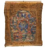 THANGKA DEPICTING CHAKRASAMVARA TIBET, 19TH CENTURY distemper on cloth, sewn into an inscribed cloth