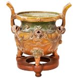 SANCAI-GLAZED TRIPOD CENSER MING DYNASTY the baluster sides decorated in high relief with masks