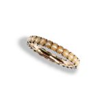 AN EARLY NINETEENTH CENTURY HALF PEARL ETERNITY RING, CIRCA 1830 set throughout with half pearls
