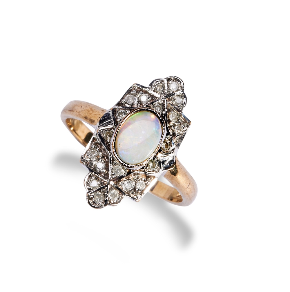 AN OPAL AND DIAMOND ART DECO STYLE RING the central oval opal cabochon collet set over a plaque