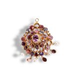A LATE 19TH CENTURY INDIAN HAIR ORNAMENT, CIRCA 1890, the oval mixed-cut pink sapphire, collet set