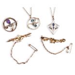 A COLLECTION OF EDWARDIAN JEWELLERY including three gem set brooches and two paste set pendant