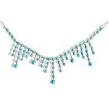 A TURQUOISE AND GOLD FRINGE NECKLACE,  CIRCA 1890 the graduating row of articulated turquoise set