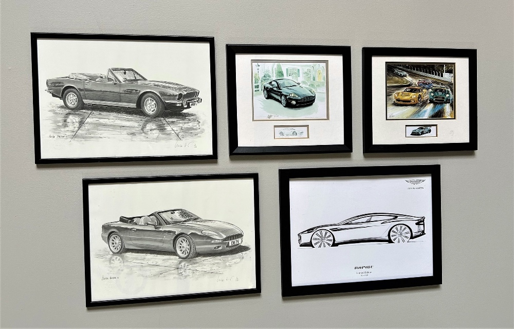 A COLLECTION OF ASTON-MARTIN FRAMED PRINTS DB7 by Mike Harbar V8 by Mike Harbar Vanquish by Uli