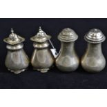 Two pairs of silver pepperettes, maker's marks & dates rubbed, Chester & London respectively, gross