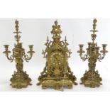 Late C19 French gilt brass mantle clock, with garniture by Ch Levassort, Paris, no. 468. In running