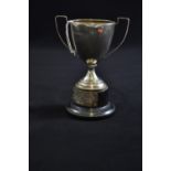 Small silver twin-handled trophy cup, maker B&W LTD, Birmingham 1930, with trophy stand with plaque