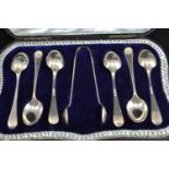 Cased set of six silver teaspoons & pair of sugar nips, maker TB&S, Sheffield 1901-02, inscribed to