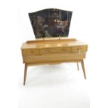 Mid-century dressing table, by Alfred Cox. With large mirror over 3 drawers, over a large single dra