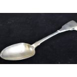 William IV Irish silver serving spoon, maker's mark TM, Dublin 1833, the terminal with a crest, leng