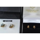 Pair of 14ct gold & diamond ear studs, 1 gram, & a pair of 9ct gold & blue stone ear studs, 1.63 gra