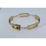 9ct bi-colour gold hinged bracelet, inner width 60mm, 11.75 grams