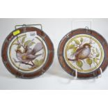 Pair of Victorian circular lead, stained & painted glass roundels, each depicting a bird, diameter 1